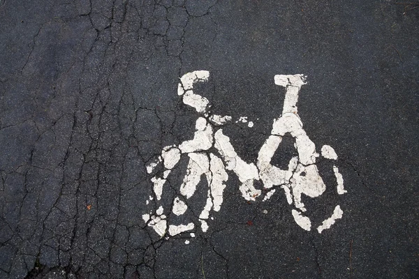 Pista ciclabile dipinta simbolo della bicicletta — Foto Stock