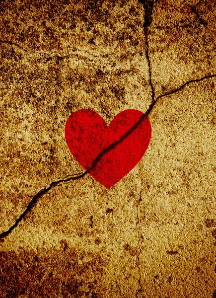 Red valentine heart on cracked grunge background — Stock Photo, Image