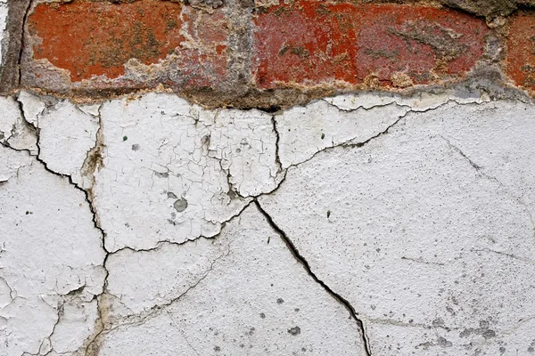 Oude gebarsten muur achtergrond — Stockfoto