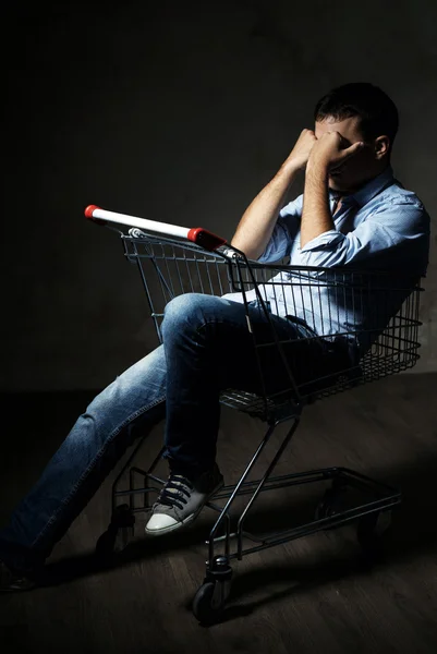 Guy in shopping cart — Stock Photo, Image