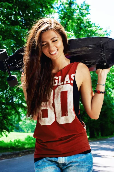 Urban girl with longboard — Stock Photo, Image