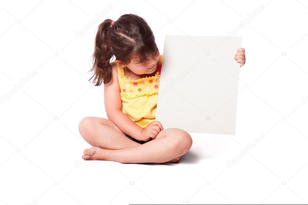 Cute girl sitting with whiteboard