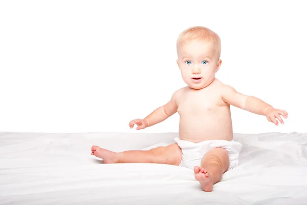 Cute happy sitting baby — Stock Photo, Image