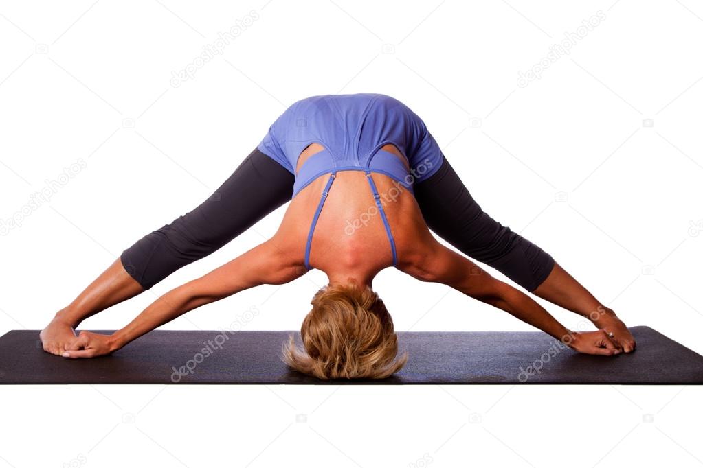 Head on floor yoga inversion pose