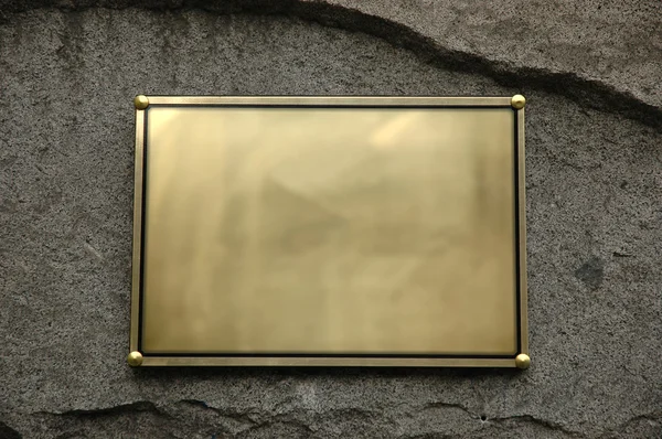 Placa de metal dourado — Fotografia de Stock