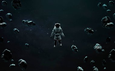 Astronot asteroit alanındaki uzay yürüyüşünde. 5K gerçekçi bilim kurgu sanatı. Görüntü elementleri Nasa tarafından sağlandı