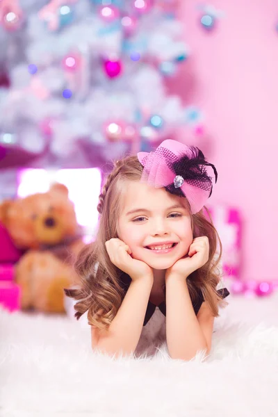 Little girl with Christmas gifts Stock Image