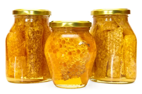 Elszigetelt fehér méz üvegek — Stock Fotó