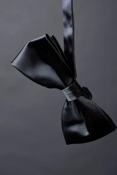 Vlinder-stropdas geïsoleerd op zwarte achtergrond — Stockfoto