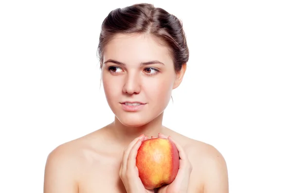 Beautiful brunette with the red apple — Stock Photo, Image