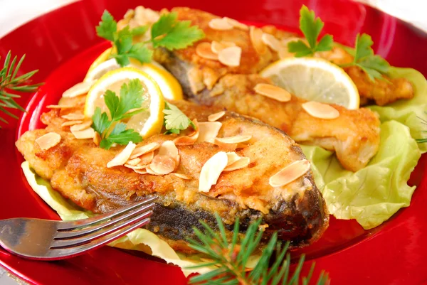 Fried carp with almonds for christmas — Stock Photo, Image