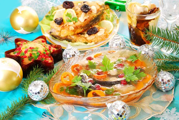 Carp in jelly with carrot and cranberry for christmas — Stock Photo, Image