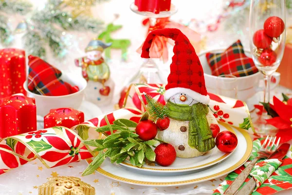 Christmas table set with funny snowman — Stock Photo, Image