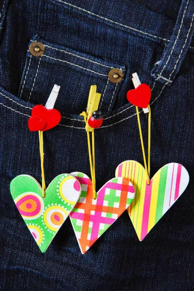 Valentine`s card with hearts on denim pocket — Stock Photo, Image