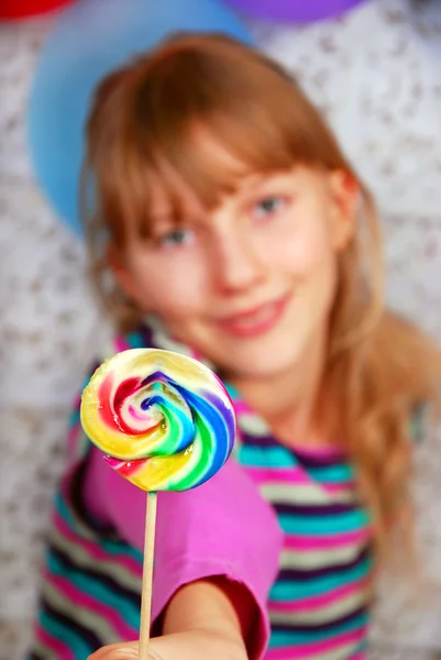 Young girl with lollipop — Stock Photo, Image