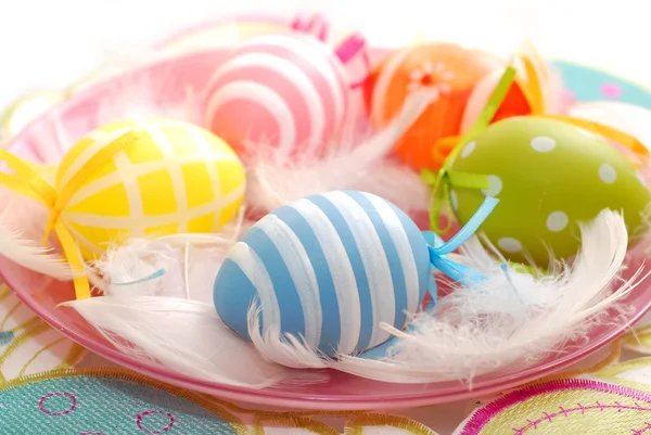 Colorful easter eggs on the plate — Stock Photo, Image