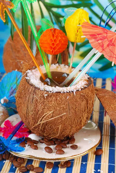Iced coffee served in coconut shell — Stock Photo, Image
