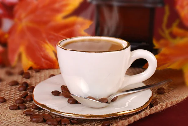 Black hot coffee in white cup for autumn — Stock Photo, Image