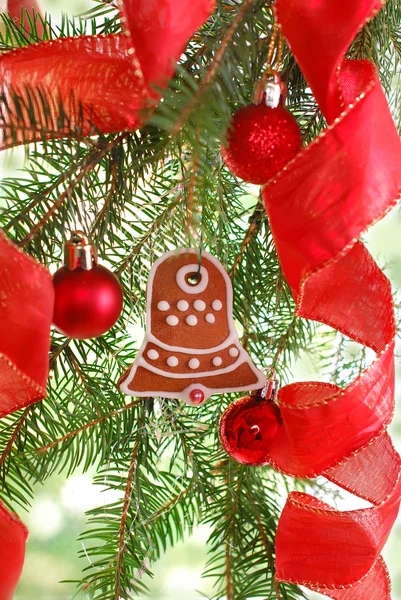 Homemade gingerbread cookie hanging on christmas tree — Stock Photo, Image