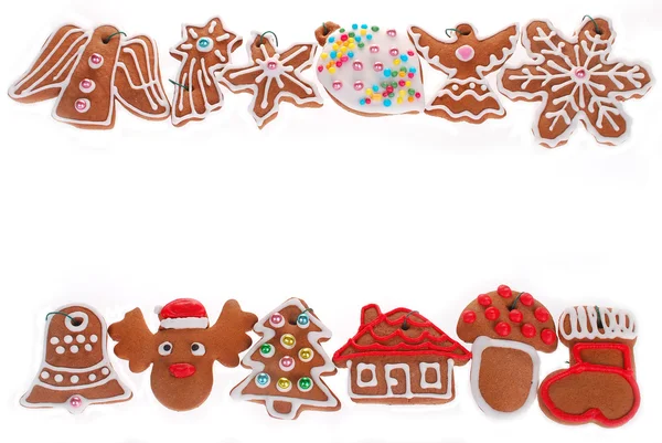Christmas border with gingerbread cookies isolated on white — Stock Photo, Image