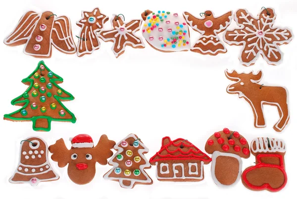 Christmas frame with gingerbread cookies isolated on white — Stock Photo, Image