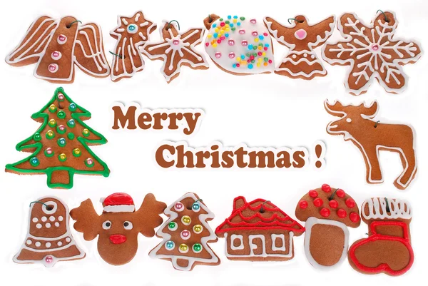 Beyaz izole gingerbread çerezleri Noel çerçeve — Stok fotoğraf