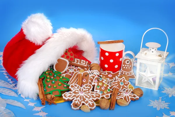 Milk and assortment of gingerbread cookies for santa — Stock Photo, Image