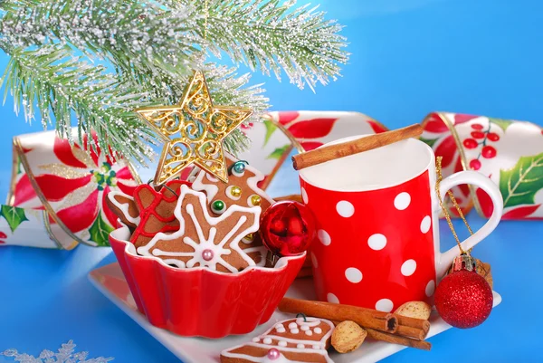 Milk and assortment of gingerbread cookies for santa Stock Picture