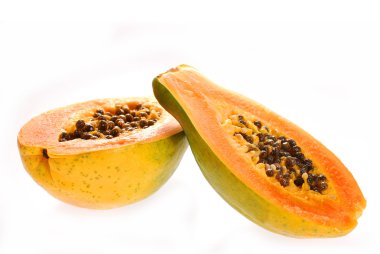 two halves of fresh papaya isolated on white clipart