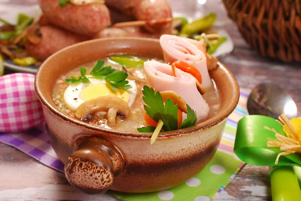 White borscht with rolled ham on skewer for easter — Stock Image White borscht with rolled ham on skewer for easter Royalty Free Stock Images