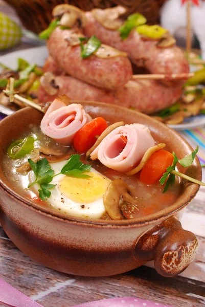 White borscht with rolled ham on skewer for easter — Stock Image White borscht with rolled ham on skewer for easter Stock Picture