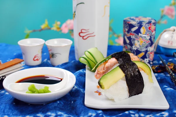Nigiri sushi with salmon and avocado — Stock Photo, Image