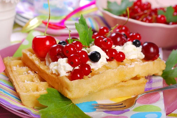 Waffles with whipped cream and fresh summer fruits — Stock Photo, Image