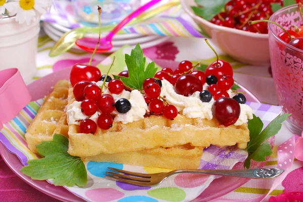 Waffles with whipped cream and fresh summer fruits — Stock Photo, Image