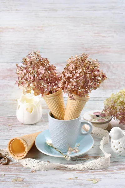 Creative Still Life Dried Hydrangea Flowers Wafer Cones Blue Mug — Stock Photo, Image