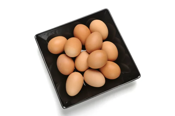 卵と黒プレート ストック画像