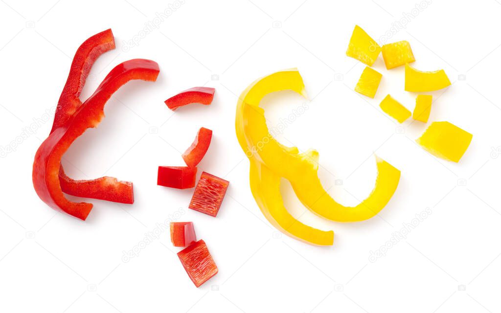 Sweet bell pepper pieces isolated on white background. Red and yellow paprika. Top view