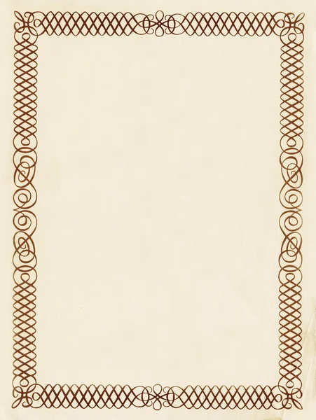 Антикварная бумага с декоративной рамой и рваными краями — стоковое фото