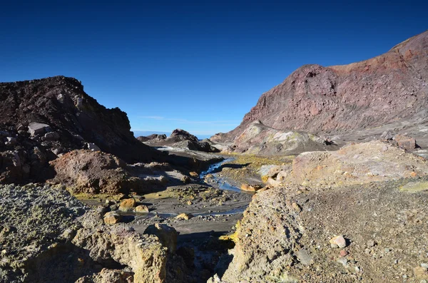 Island "White Island" . Surface of the crater of an active volcano. New Zealand. — Stock Photo, Image