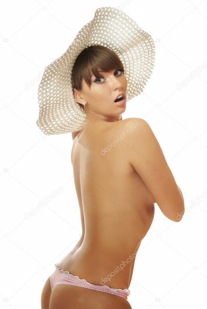 The naked brunette in a hat