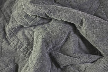 Bir yatak battaniyesinin stüdyo fotoğrafı.