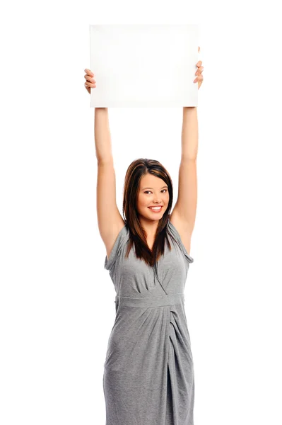 Pretty girl holding a white board — Stock Photo, Image