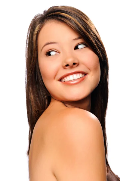 Young woman looking behind her shoulder — Stock Photo, Image