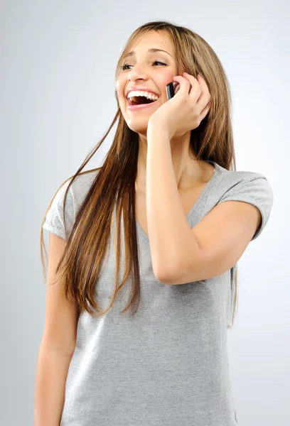 Carefree girl with mobile phone — Stock Photo, Image