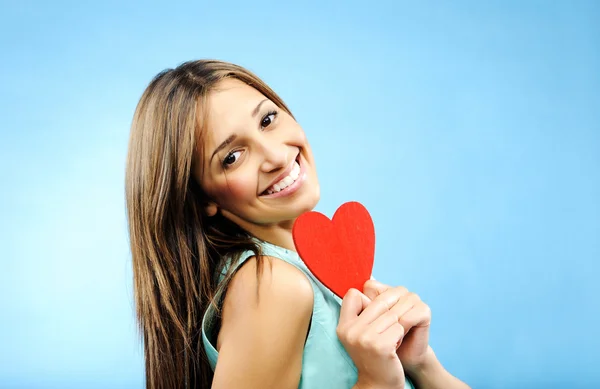 Giovane donna con simbolo del cuore — Foto Stock