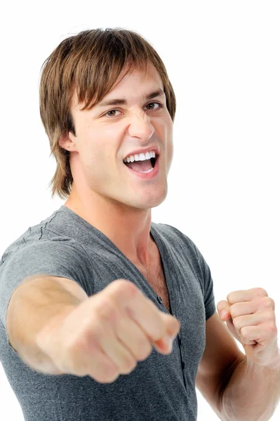 Scary man with fists clenched boxing towards camera showing agression — Stock Photo, Image