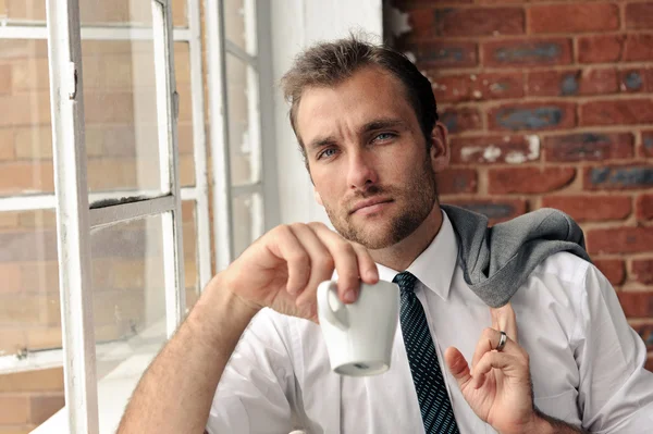 Window portrait of business man — Stock Photo, Image