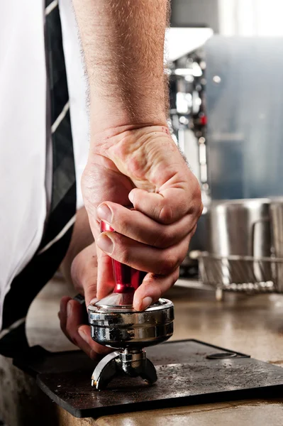 Tamper and barista — Stock Photo, Image