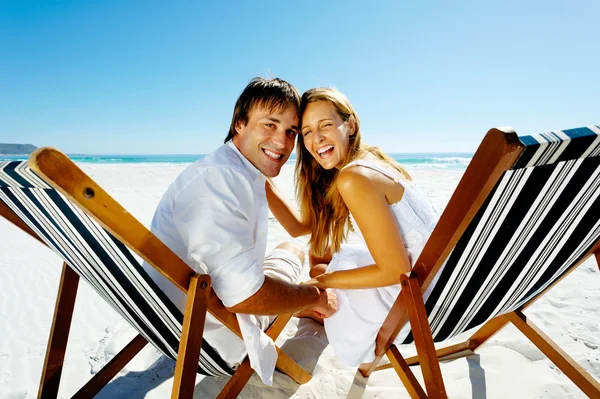 Smiling beach portrait couple Stock Picture