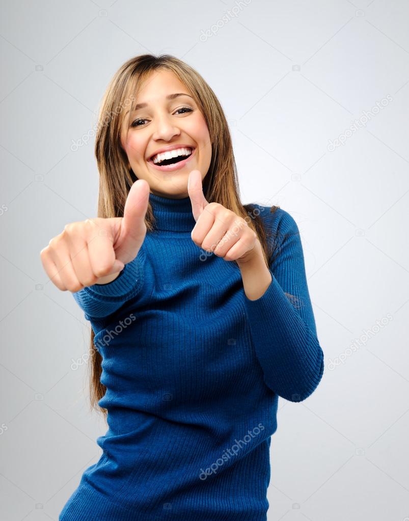 Happy thumbs up woman